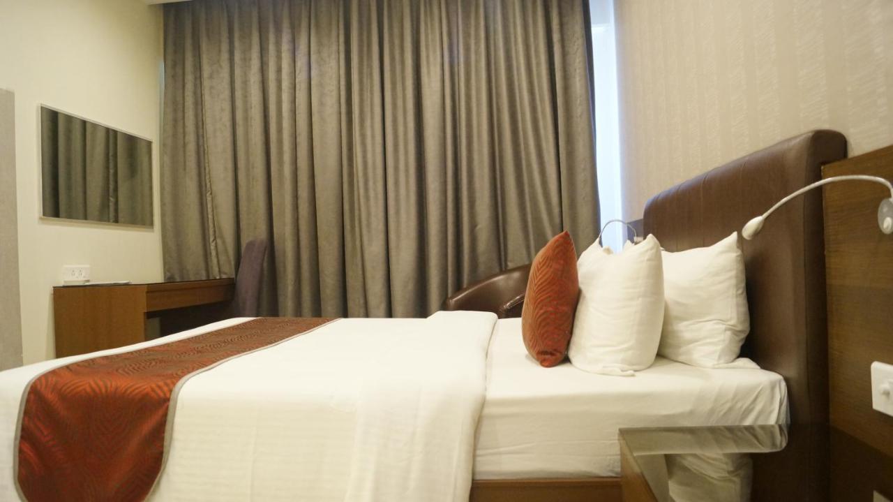 V 7 Hotel Čennai Pokoj fotografie
